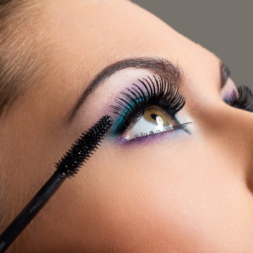 Beautiful girl with colorful makeup Cute, attractive woman with colorful makeup